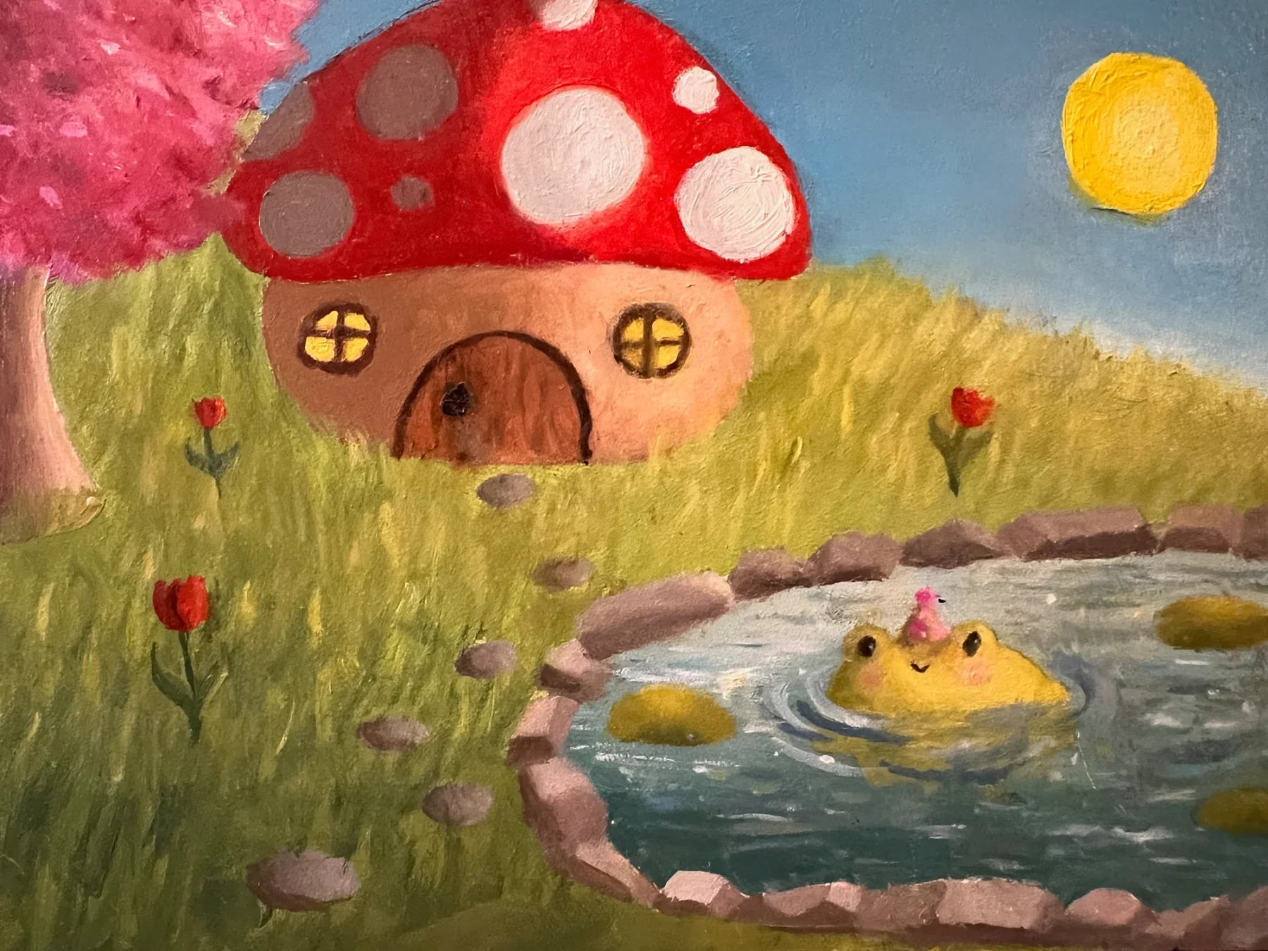 Painting of a red mushroom house beside a pond with a smiling frog