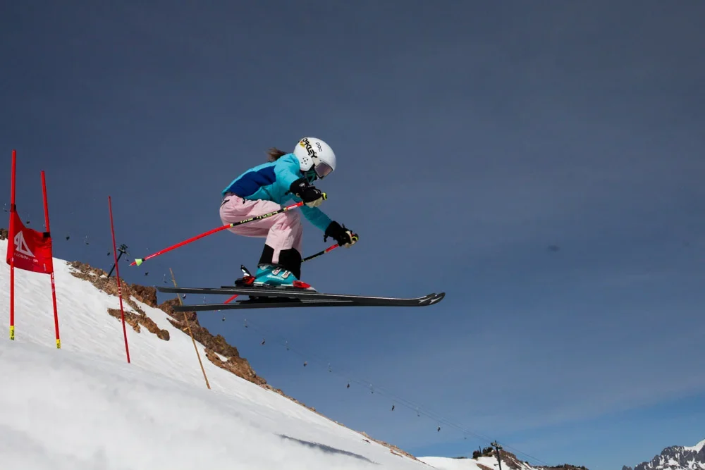 A skier airborne during jump training.